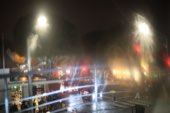 A street lit up after dark