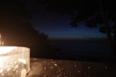 A fire burning after dark