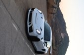 A white Porsche GT3 RS seen head on