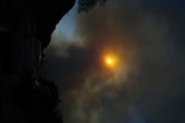 Smoke rising over the hills during the Palisades fire