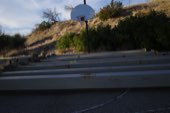 A basketball hoop on a hillside
